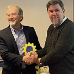 Photo of John Lienhard (left) receiving the Distinguished Alumnus award from Carlos Coimbra at the Department of Mechanical Engineering, UC San Diego.